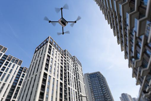3d illustration of drones flying above high rise buildings