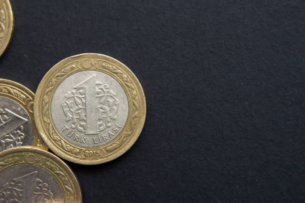 istock Turkish lira coins on black background 1488878050