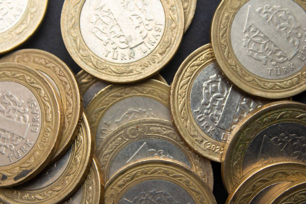 istock Turkish lira coins on black background 1488878379