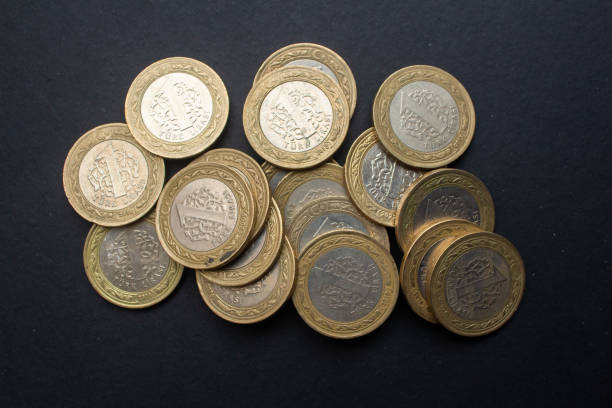 istock Turkish lira coins on black background 1488878417