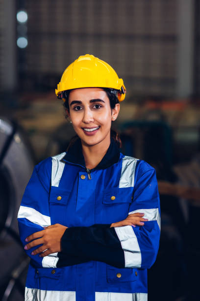 istock Foreman or worker work at factory site check up machine or products in site. 1488882611