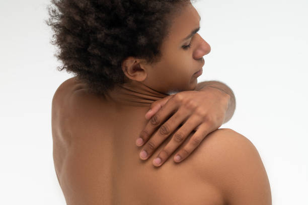 istock Curly-haired african american guy suffering from pain in his back 1488884363