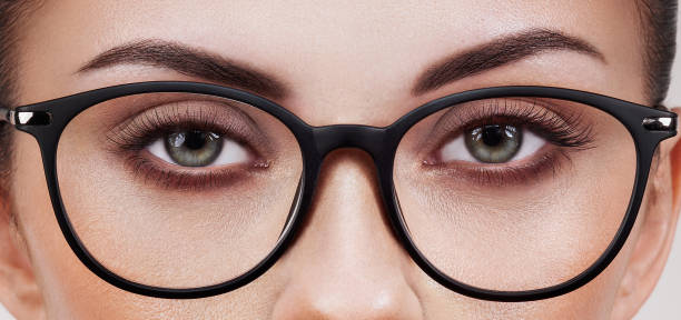 istock Woman with long eyelashes in eyeglasses 1488888801