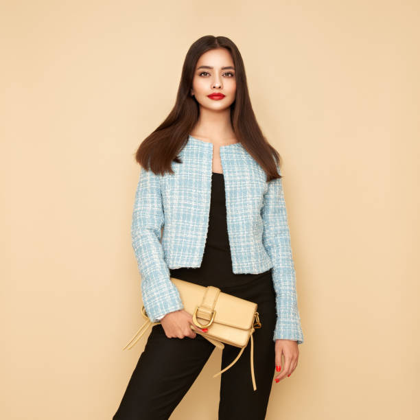 istock Young brunette woman in blue jacket 1488888872