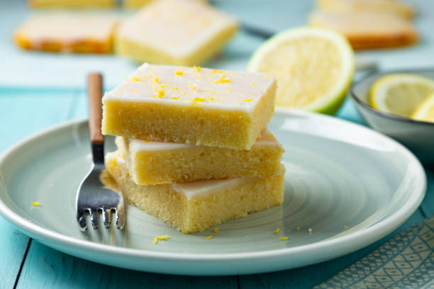 istock Stack of fresh lemon brownies on an aquamarine dish 1488889761