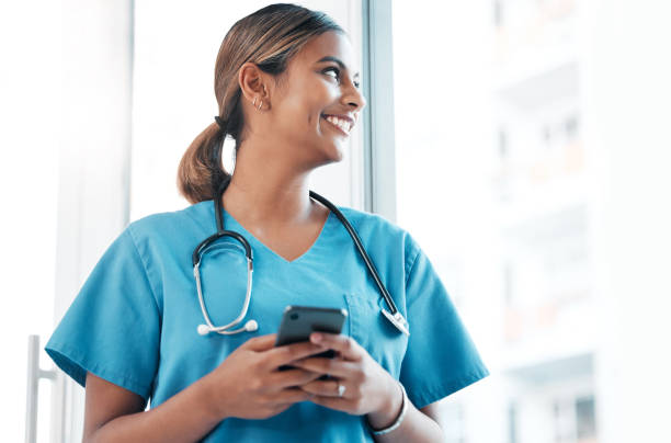 istock Idea, social media and doctor with a phone for communication, email and schedule. Thinking, ambition and woman nurse typing on a mobile for an app chat, healthcare research and conversation 1488893947