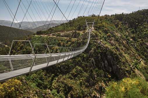 It is one of the longest pedestrian suspension bridges in the world, with a span of 516 meters and 175 meters high above Paiva River. The bridge located in Arouca Geopark of Arouca Municipality next to Paiva Walkways.