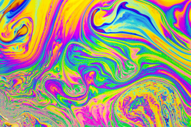 istock Psychedelic multicolored background abstract. Rainbow colors. patterns background. Photo macro shot of soap bubbles 1488896562