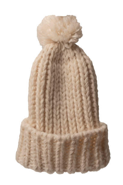 istock Beige beanie hat with pom pom isolated on a white background. 1488899662