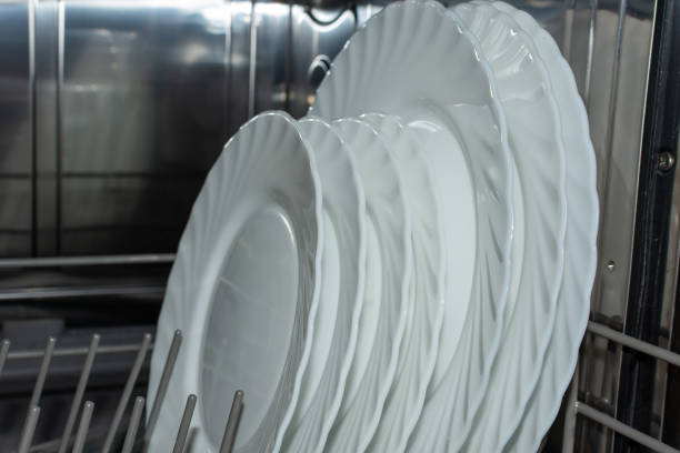 istock White clean plates in a dishwasher 1488900252
