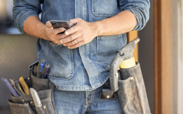 istock Closeup, hands and man with smartphone, maintenance and research for instructions, deadline or schedule. Zoom, male or handyman with cellphone, social media or typing for connection or search on site 1488903570