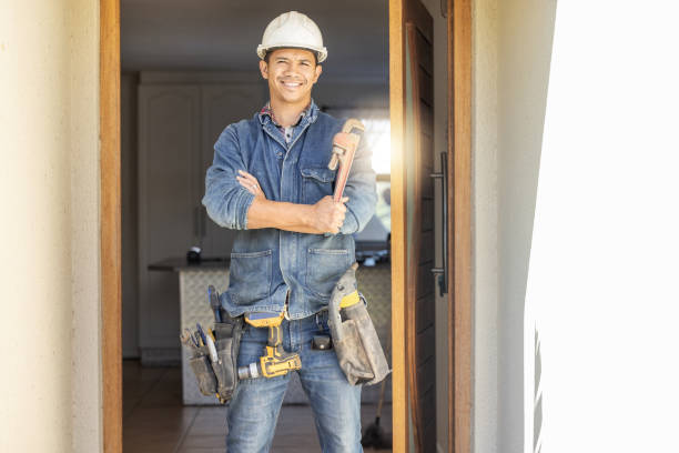istock Handyman in portrait, maintenance and tools with construction and home renovation, builder with smile. Professional, contractor and DIY skills, architecture and wrench, male with helmet for safety 1488903641