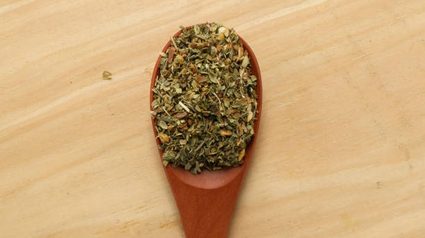 istock Parsley leaves dried on a wooden spoon 1488905383