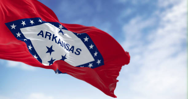 istock Arkansas state flag waving in the wind on a clear day 1488906303