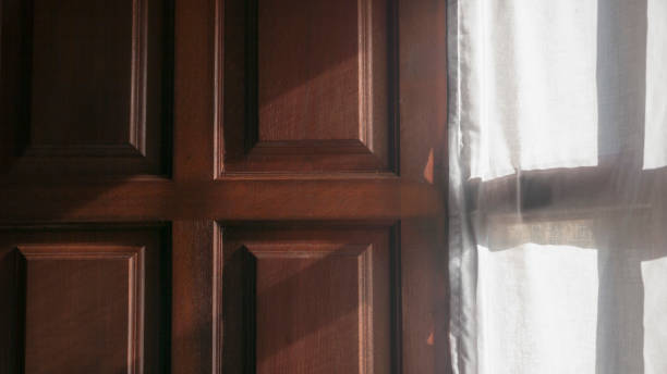 istock Wooden shutter in rural house window interior 1488908445