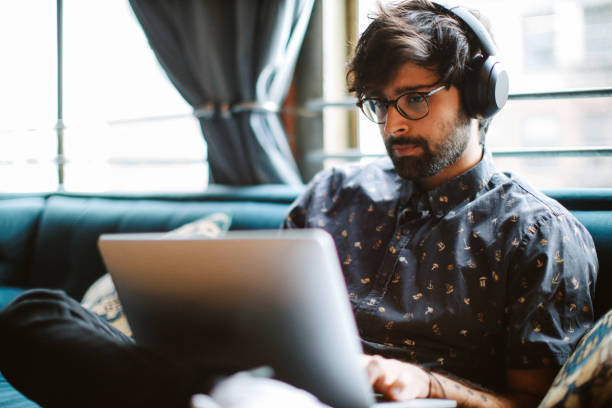 istock man working from his home in Los Angeles, California 1488918938