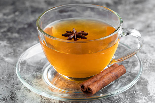 istock Anise tea with cinnamon in glass cup. 1488920448