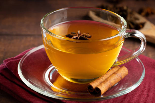 istock Anise tea with cinnamon in glass cup. 1488920540