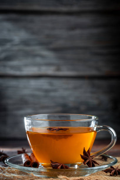 istock Anise tea with cinnamon in glass cup. 1488920541