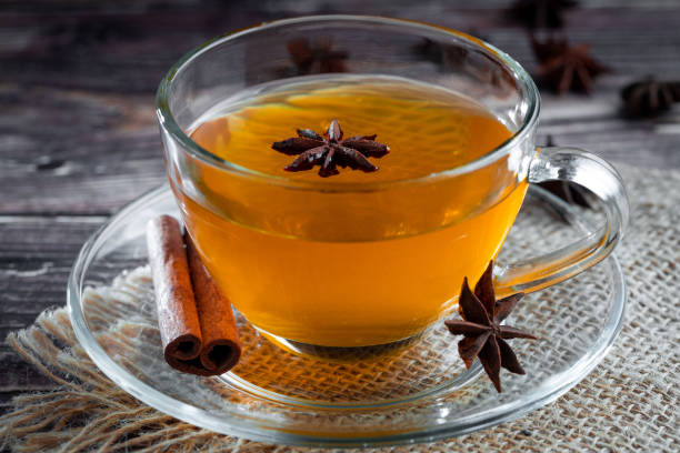 istock Anise tea with cinnamon in glass cup. 1488920573