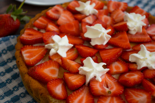 istock Pie with fresh strawberries on old background 1488921127
