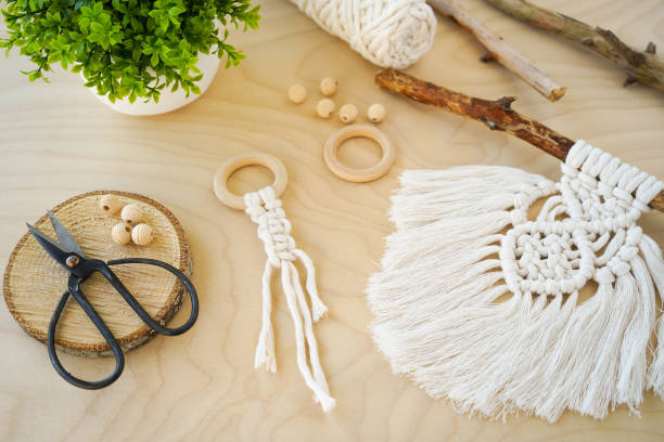 istock A Hand-Made Macrame amulet with Wooden Rings in a Beautiful Background Setting the Mood for Creativity. 1488923418