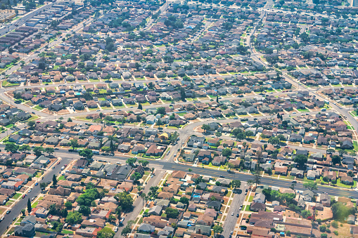 Houses in a residential district in Los Angeles, California, USA as seen from an airplane.