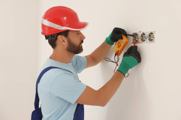 istock Professional electrician with tester checking voltage indoors 1488926655