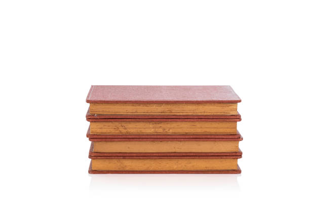 istock Stacking of old book isolated on white background with clipping path. 1488929507