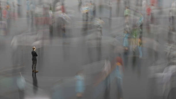 istock LowPoly man standing in the fast moving crowds of people 1488934331