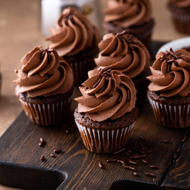 istock Dark chocolate cupcakes with chocolate ganache frosting 1488945031