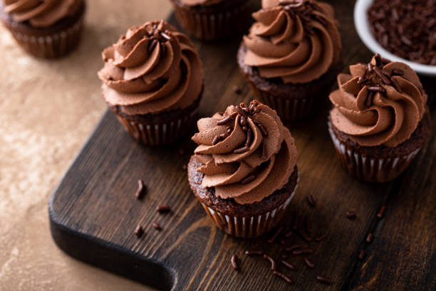 istock Dark chocolate cupcakes with chocolate ganache frosting 1488945046