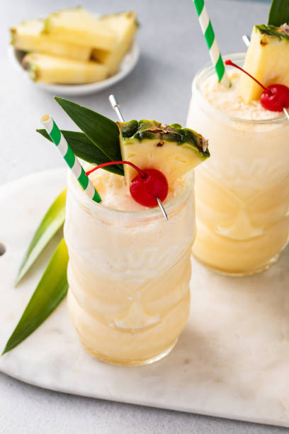 istock Tropical pina colada cocktail or mocktail in a tiki glass 1488945694