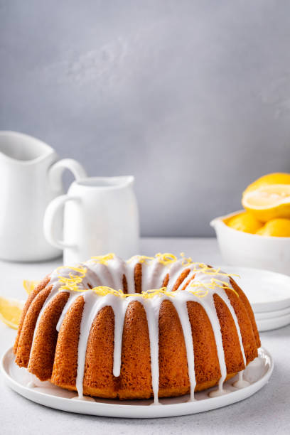 istock Lemon bundt cake drizzled with powdered sugar glaze 1488946395