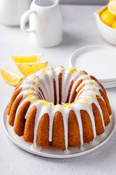 istock Lemon bundt cake drizzled with powdered sugar glaze 1488946401
