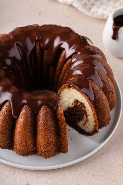 istock Chocolate marble bundt cake with chocolate glaze drizzled on top 1488946470