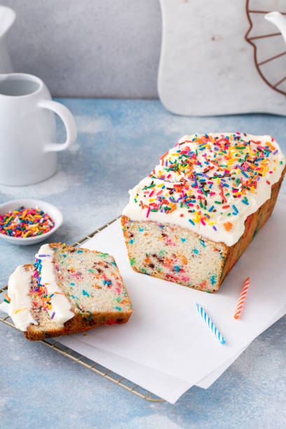 istock Birthday cake or funfetti cake with sprinkles and frosting 1488946494
