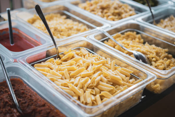 istock Hot Pasta in Serving Dishes on a buffet 1488950438
