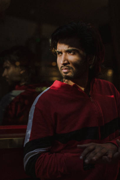 male indian model with red clothes posing for photographs - fashion men fashion model male imagens e fotografias de stock