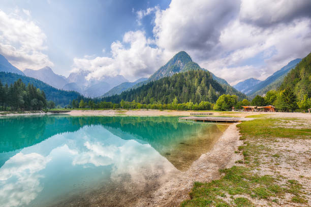 Amazing landscape on Jasna lake with beautiful reflections of the mountains. Amazing landscape on Jasna lake with beautiful reflections of the mountains. Nature scenery in Triglav national park. Location: Triglav national park. Kranjska Gora, Slovenia, Europe. julian alps stock pictures, royalty-free photos & images