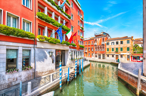 Fabulous cityscape of Venice with narrow canals, boats and gondolas and bridges with traditional buildings. Location: Venice, Veneto region, Italy, Europe