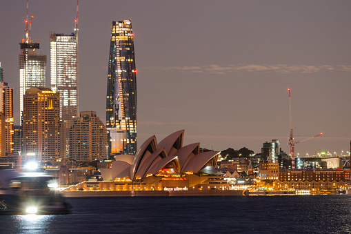 Sydney, Australia - May 6, 2023: Night view of Sydney Opera House and Crown Towers.
