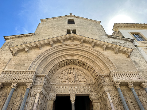Facade of St. Trophime, a Roman-Catholic church and former cathedral located in the city of Arles in the South of France.