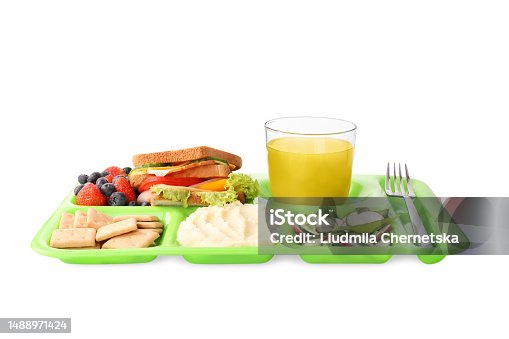 istock Serving tray with tasty healthy food and juice isolated on white. School dinner 1488971424