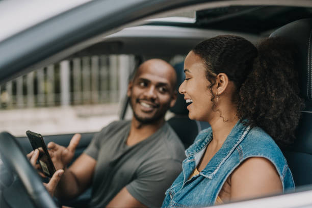 istock Couple planning road trip on smartphone 1488979788