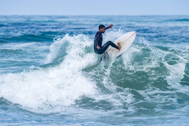 istock Surfer riding waves in Furadouro Beach 1488980966
