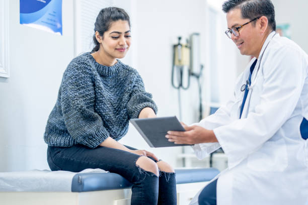 istock Young Woman at a Check-Up 1488990440