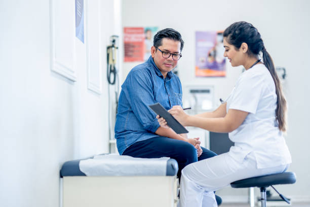 istock Middle Aged Gentleman at a Check-Up 1488990448