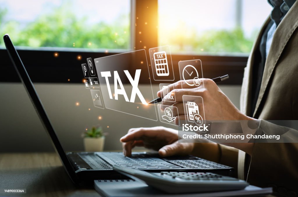 Tax deduction planning concept. Businessman calculating business balance prepare tax reduction. taxes paid by individuals and corporations such as VAT, income tax and property tax. Tax Stock Photo
