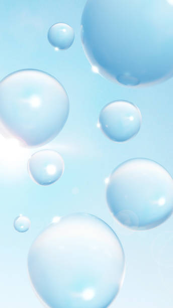 istock 3D Illustration.Multiple round water drops in blue sky. Background with sunlight. Lens flare is available. (Vertical) 1489012001